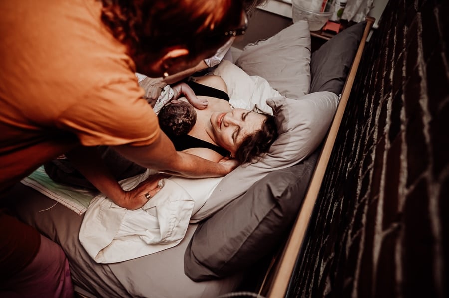 Woman giving birth at Holly No 7 birth Center Bangor Maine
