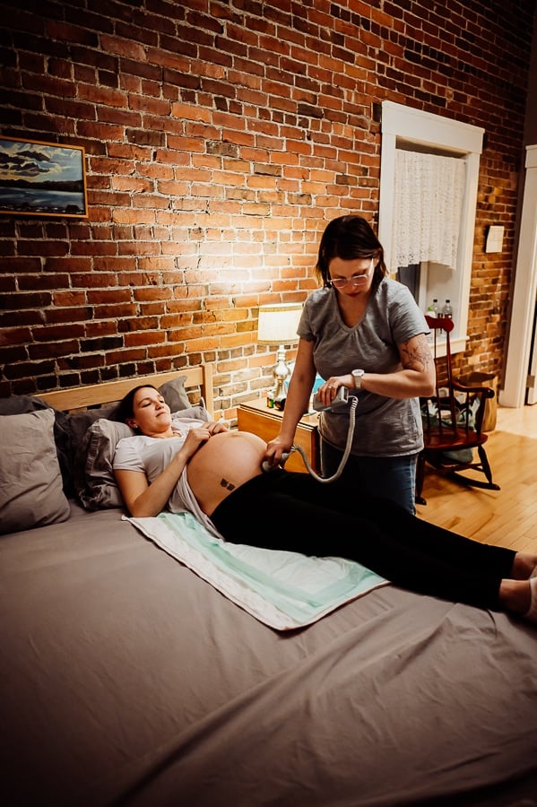 Woman giving birth at Holly No 7 birth Center Bangor Maine