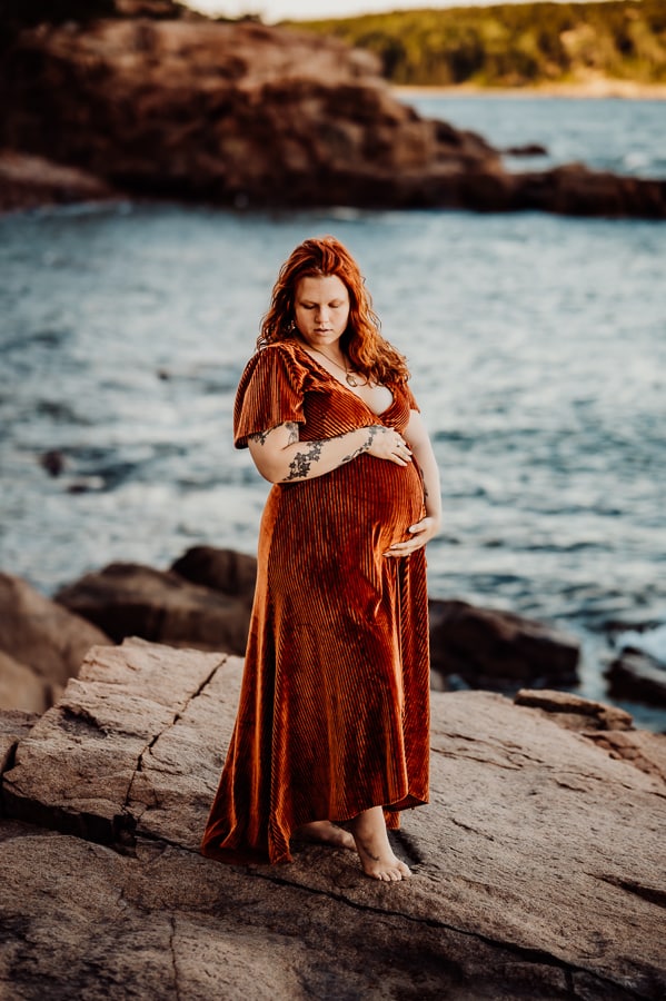 woman wearing orange velvet baltic born dress in acadia