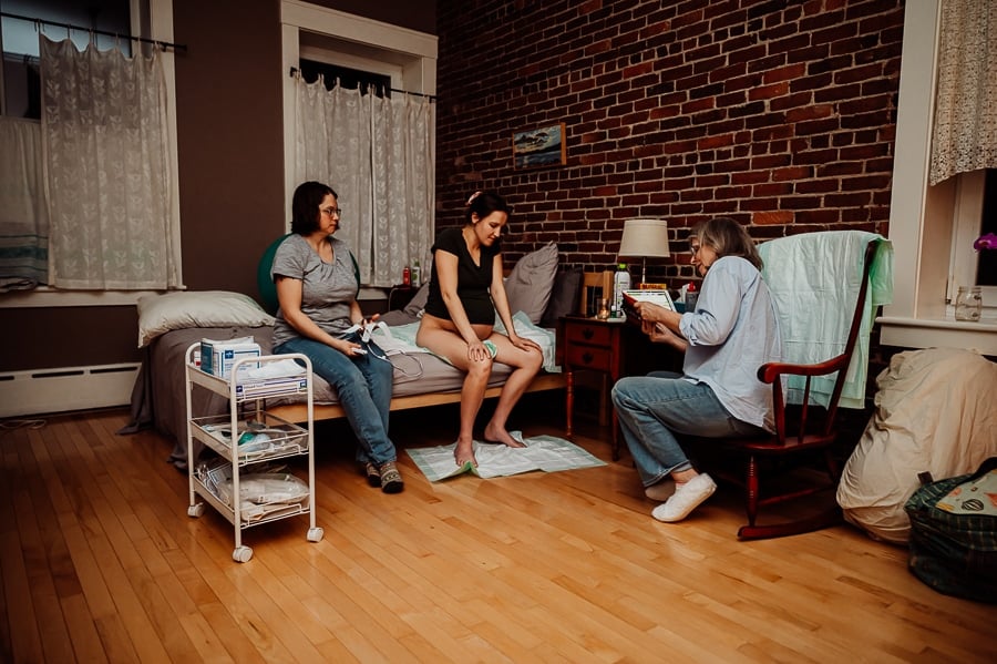 Woman giving birth at Holly No 7 birth Center Bangor Maine