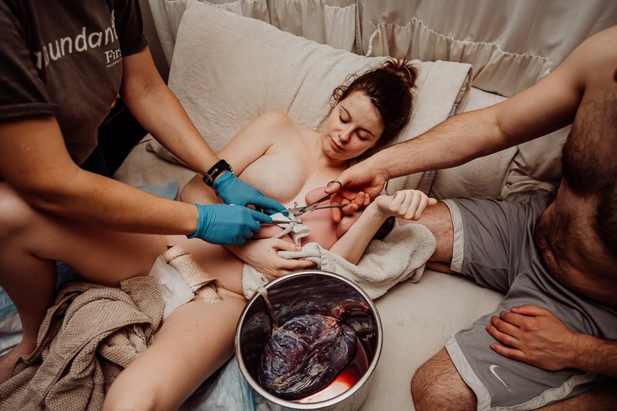 Woman giving birth at home in Maine