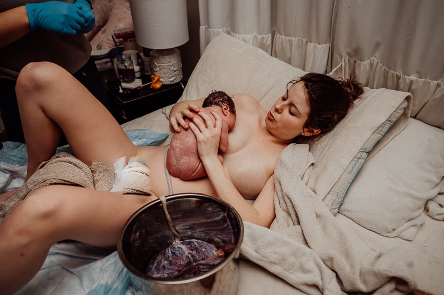 Woman giving birth at home in Maine