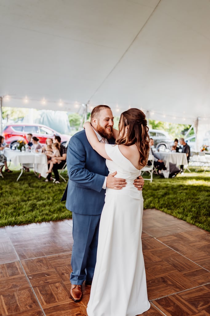 The bride and groom share their first dance.