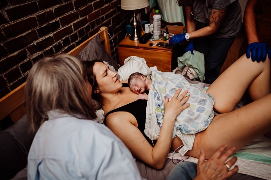 Woman giving birth at Holly No 7 birth Center Bangor Maine