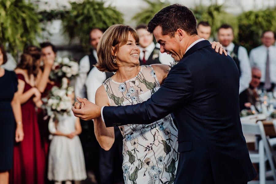 Mother and groom dancing at wedding