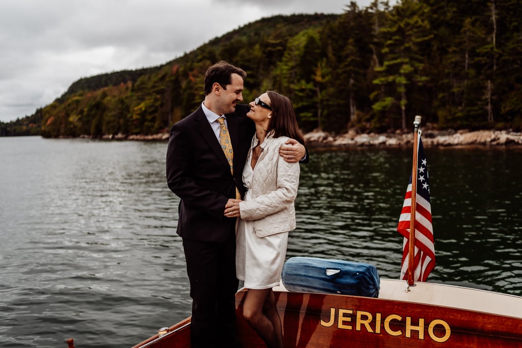 Bride and groom posing together on Jericho boat