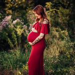 Pregnant Woman wearing red dress maternity photography