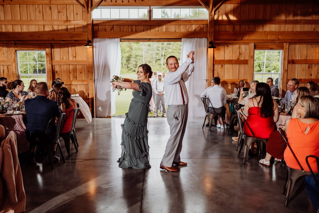 bridesmaid and groomsman entering wedding reception