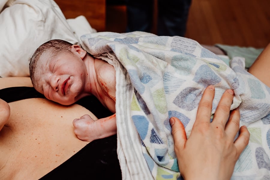 Woman giving birth at Holly No 7 birth Center Bangor Maine