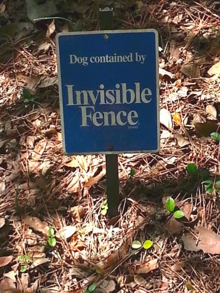 sign for Invisible Fence, electronic pet containment fence, e-fence, shock fence, or radio fence