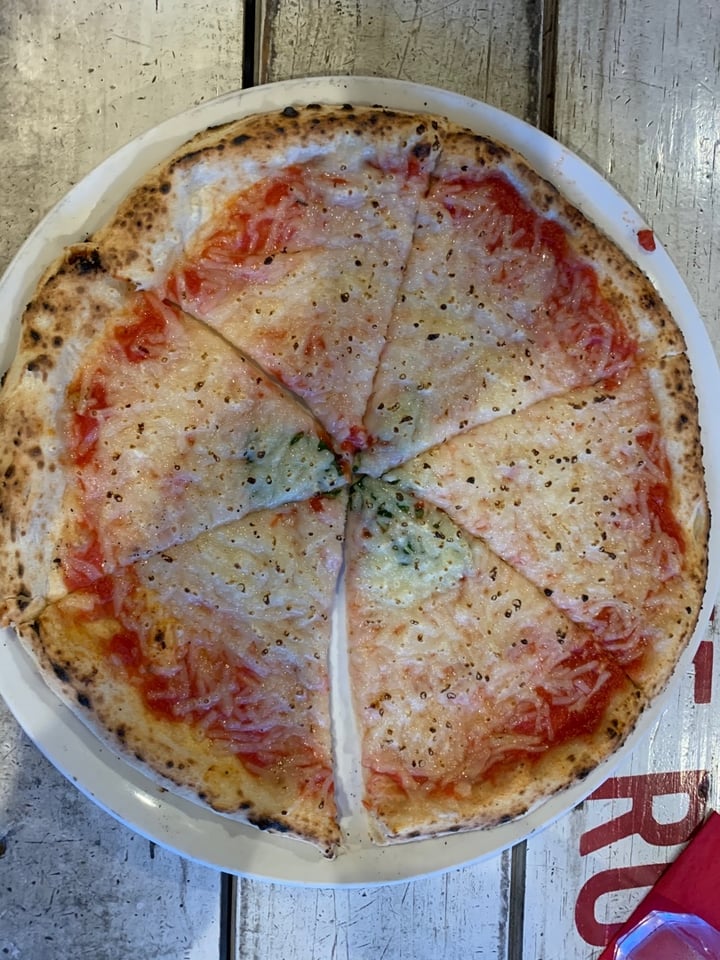 Cane Rosso's classic Margherita pizza, a pizza lover's paradise.