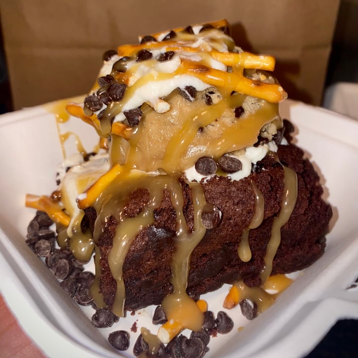 Cinnaholic Brownie with full scoop of cookie dough, frosting, and