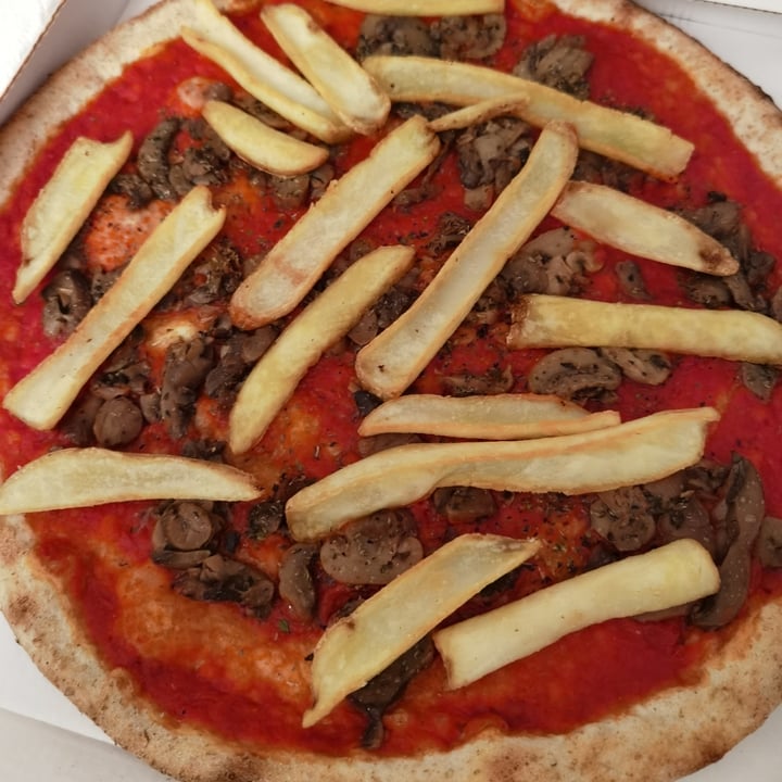 Pizzeria Da Eleonora Brescia, Italy Pizza integrale marinara con funghi