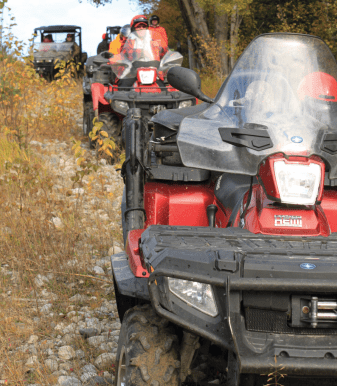 Group of hunters riding their quads near Algoma Motel in Wawa Motel