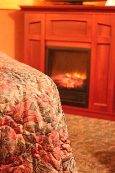 Fireplace within a room at Algoma Motel, Wawa, Ontario, Canada