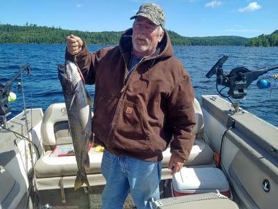 A happy customer with his Lake trout catch near the Algoma Motel and Wawa Ontario