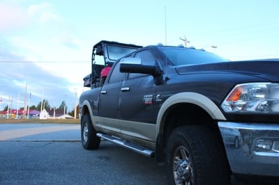 A quad and pickup truck getting ready for a another great day of bird hunting near the Algoma Motel in Wawa ontario Canada