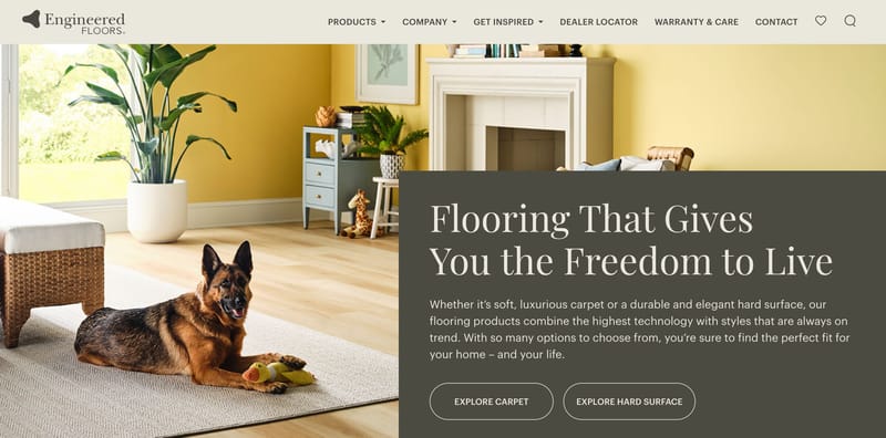 Engineered Floors homepage hero showing a dog on carpet in a sunny living room with the headline Flooring That Gives You the Freedom to Live