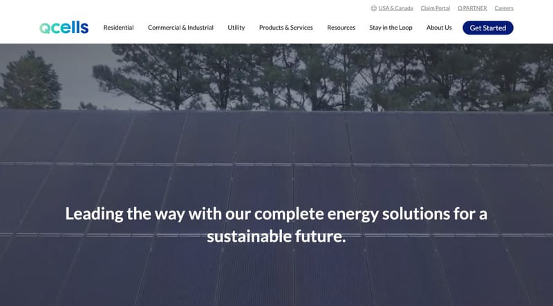 Qcells homepage hero showing rooftop solar panels with the headline Leading the way with our complete energy solutions