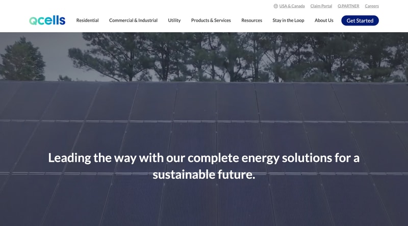 Qcells homepage hero showing rooftop solar panels with the headline Leading the way with our complete energy solutions