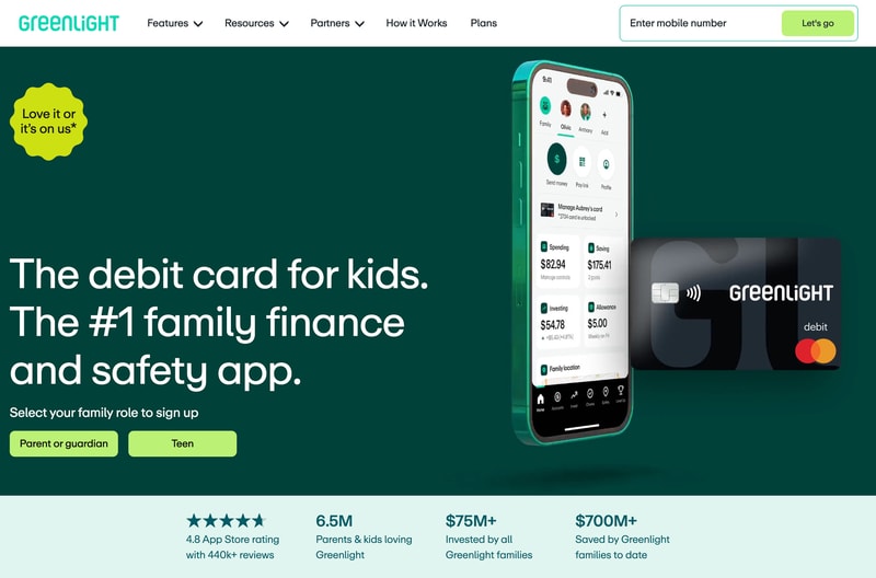 Greenlight homepage hero on a dark green background with the headline "The debit card for kids. The #1 family finance and safety app." alongside a phone mockup of the Greenlight app and a black Greenlight Mastercard, plus Parent or guardian and Teen self-select buttons and a row of social-proof stats below