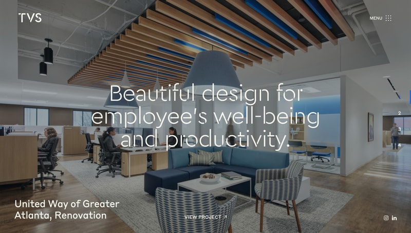TVS Design homepage hero with full-bleed photograph of the United Way of Greater Atlanta office renovation, headline reading "Beautiful design for employee's well-being and productivity"