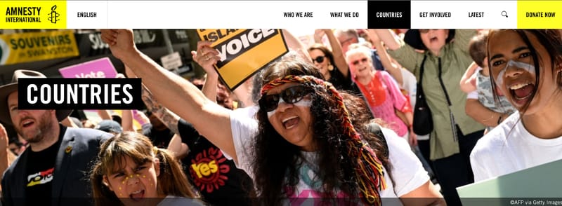 screenshot of nonprofit Amnesty International's country page showing compelling imagery of a protest