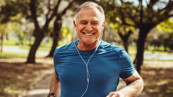 Senior man running, looking healthy and happy