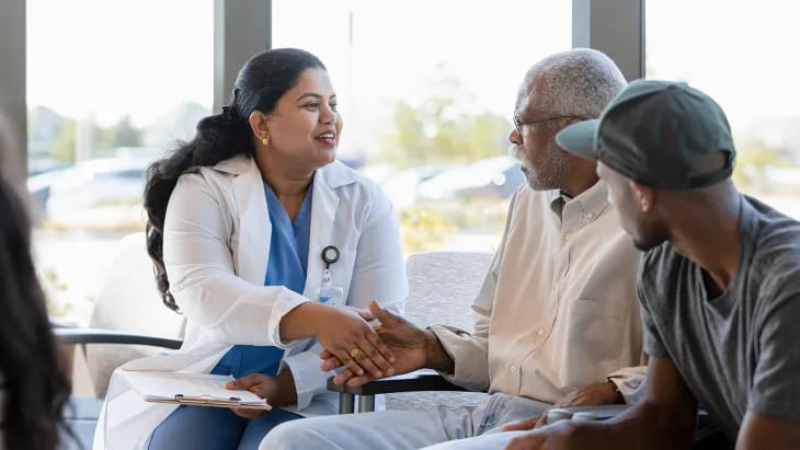 Hospice physician meeting with patient