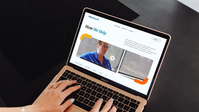 BeneLynk website, How We Help page, on a laptop