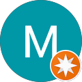 M B