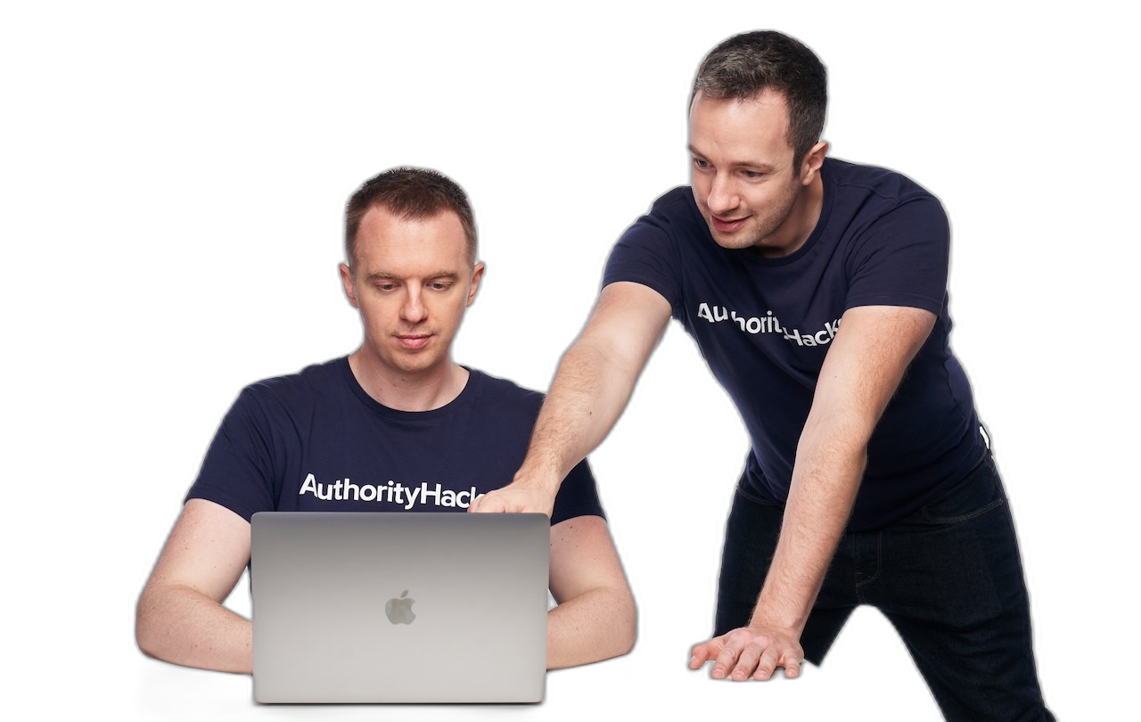 Gael and Mark from Authority Hacker working together at a laptop