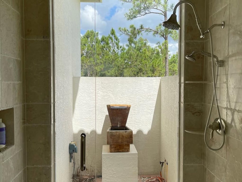 Stone work done on bathroom wall and floor
