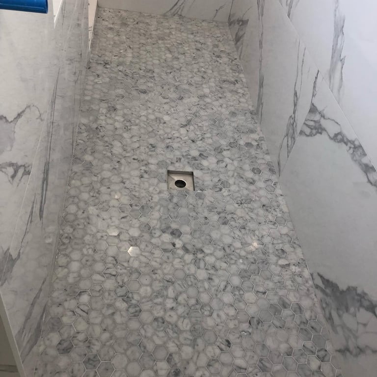 Tile work done on bathroom floor