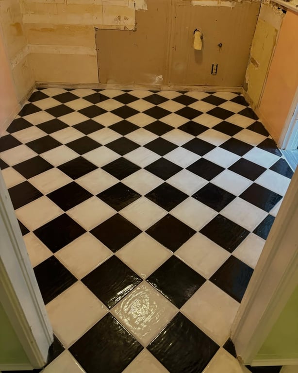 Tile work done on bathroom floor