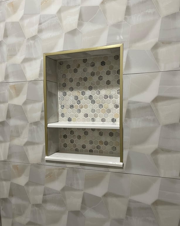 Tile work done on bathroom wall