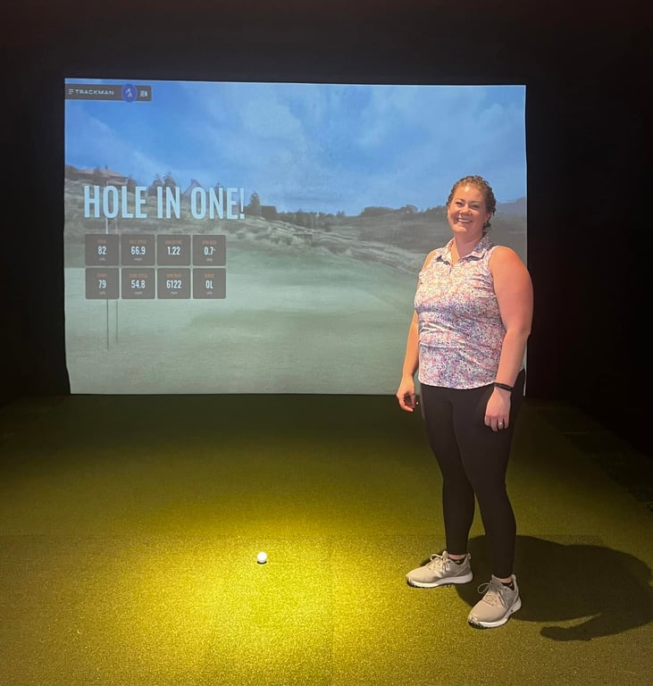 Jen Staude after their hole-in-one at Promontory, Dye Canyon Course