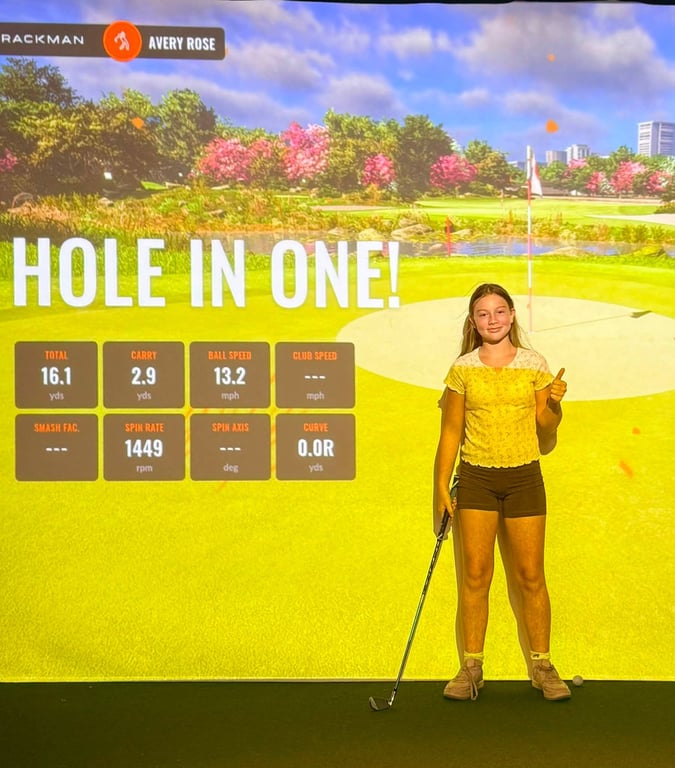 Avery R. after their hole-in-one at Tokyo Gardens