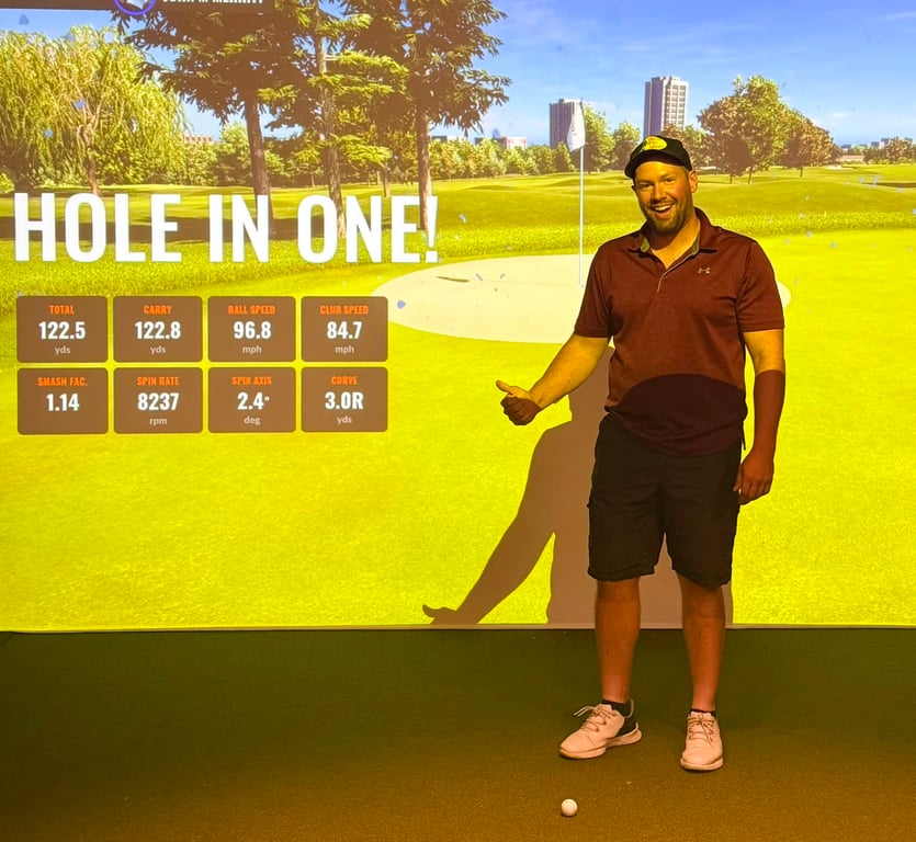John Merritt after their hole-in-one at Weston Golf and CC