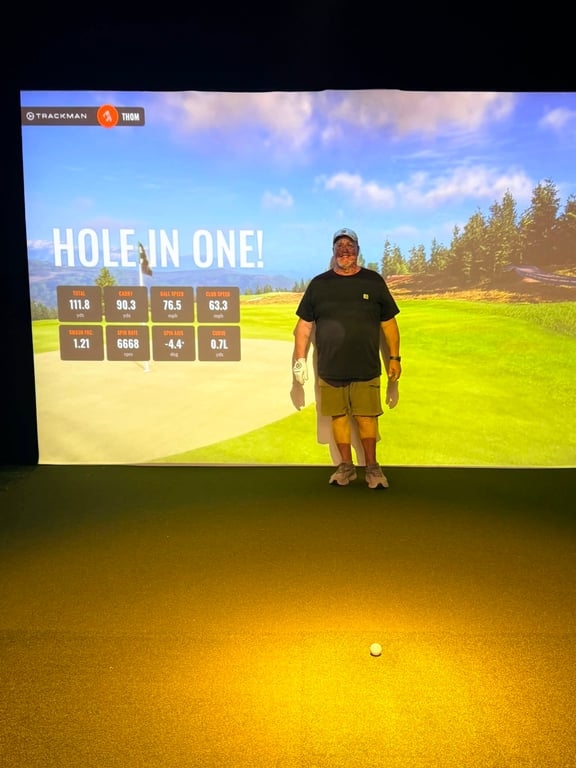 Thom Papaik after their hole-in-one at Yellowstone