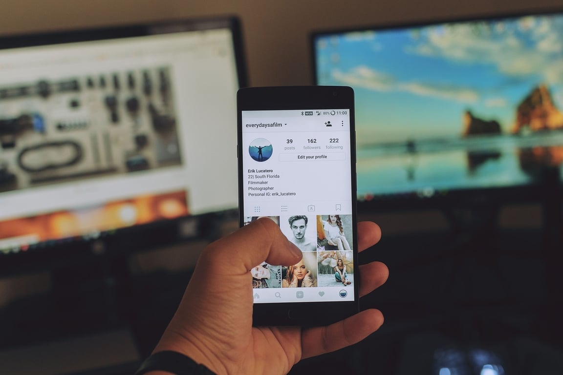 Mobile phone displaying social media video content