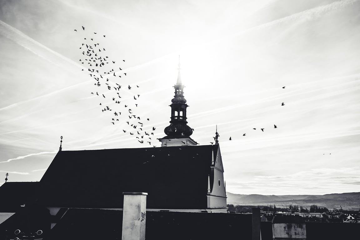 Church steeple at mid-day, black and white