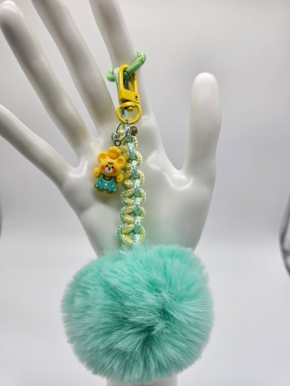 Sky Blue Pom-Pom Keychain with Yellow and Mint Beads and a Yellow Bear Charm