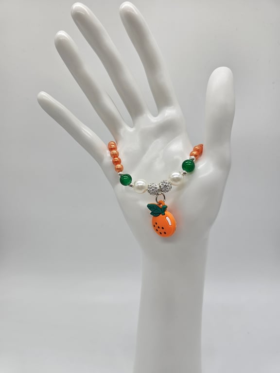 Orange and Green Beaded Bracelet with Silver Charm