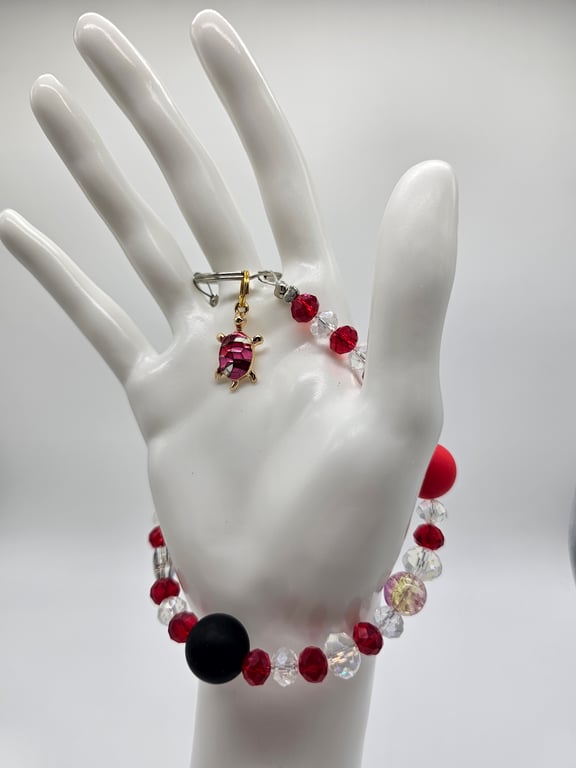 Red and Clear Beaded Phone Wristlet with Black Focal Bead and Silver Charm