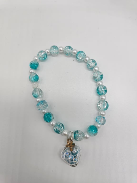 Sky Blue and Clear Beaded Stretch Bracelet with Silver Charm — photo 2