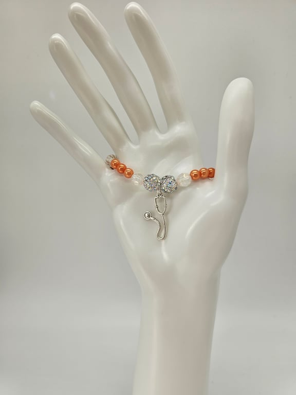 Crystal and Orange Beaded Bracelet with Stethoscope Charm