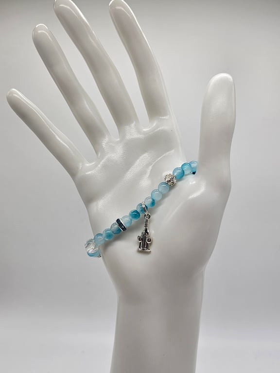 Sky Blue and Clear Beaded Bracelet with Silver Menorah and Wine Charms