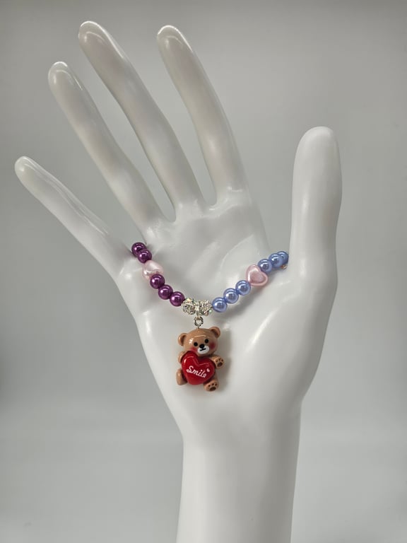 Purple and Pink Beaded Bracelet with Teddy Bear Charm
