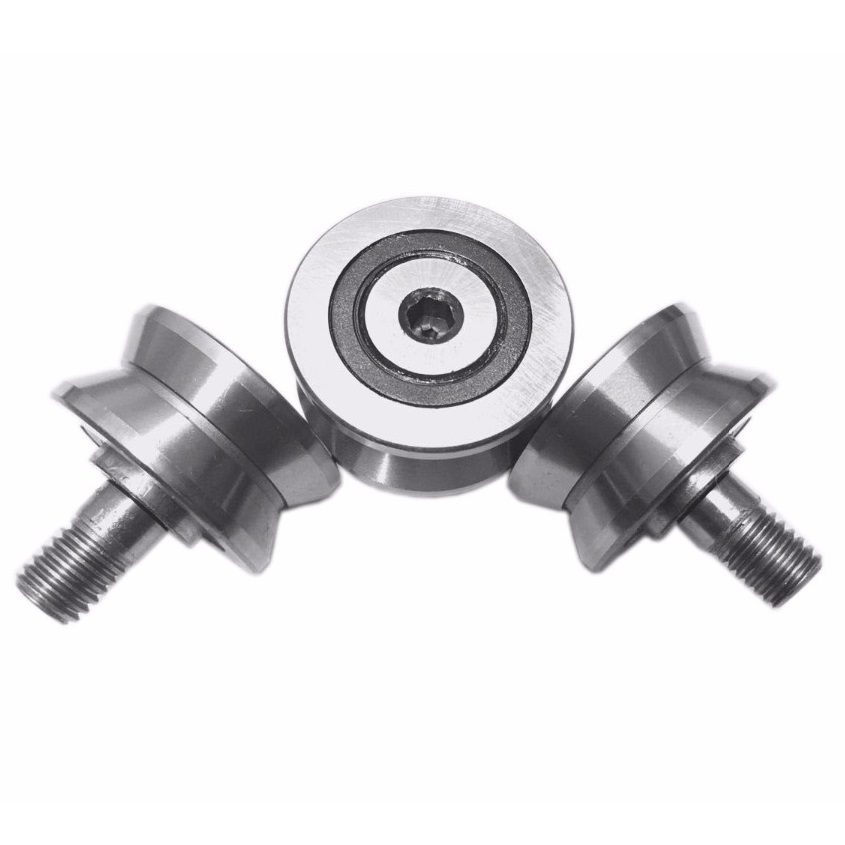 Integral studded V guide wheel and track roller